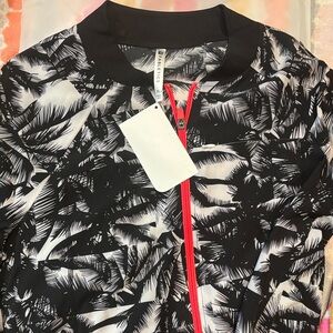 Fabletics Black and White Leaf Jacket with Pink Accent